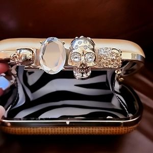 "Brass Knuckle" evening bag.